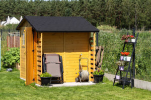 a wooden garden shed standing on a concrete founda 2026 03 23 23 02 28 utc Easy Resize.com